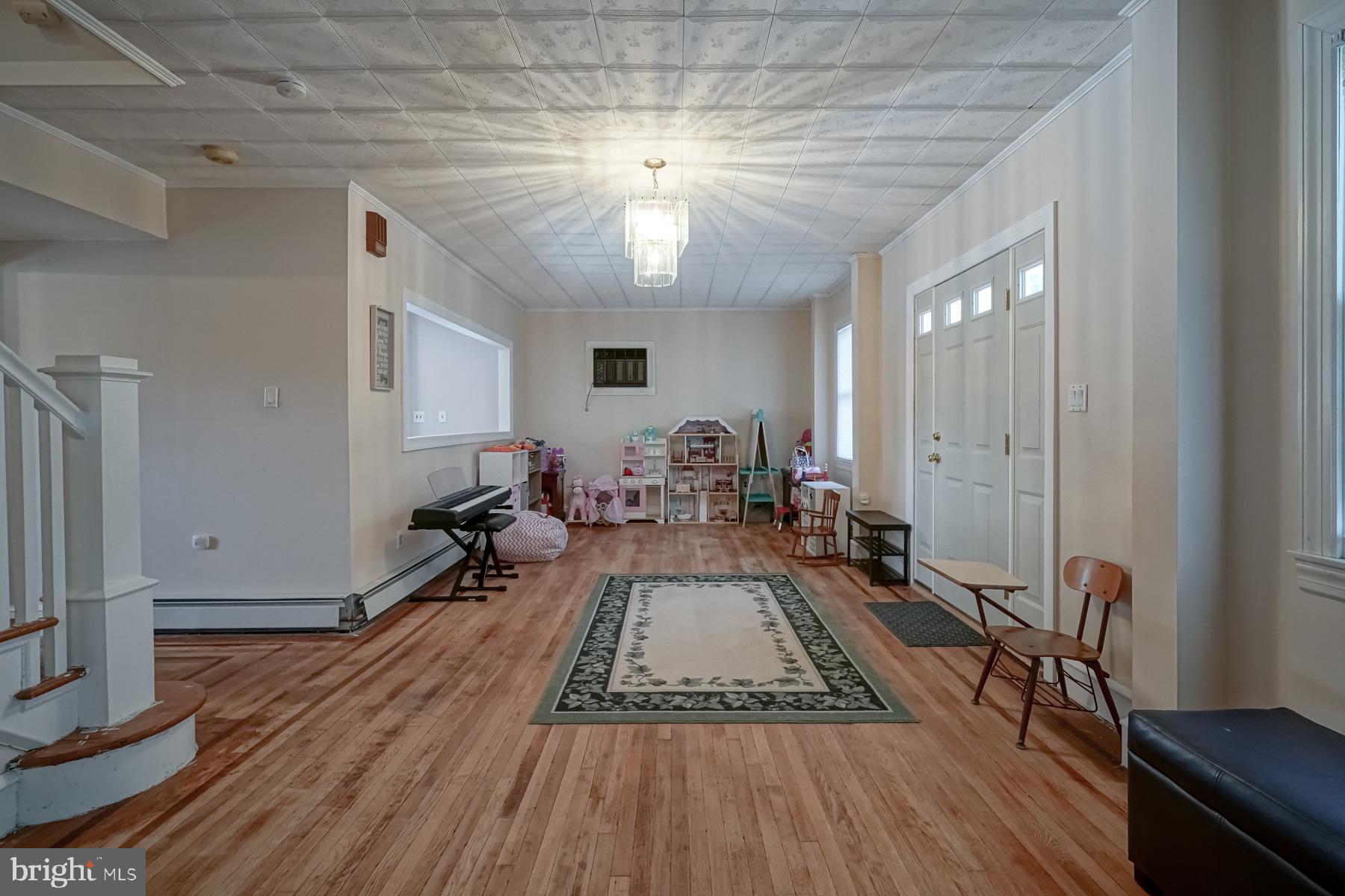 124 North 1st Road Hammonton, NJ 08037 - Photo 11 of 29 a spacious bedroom with a bed and wooden floor