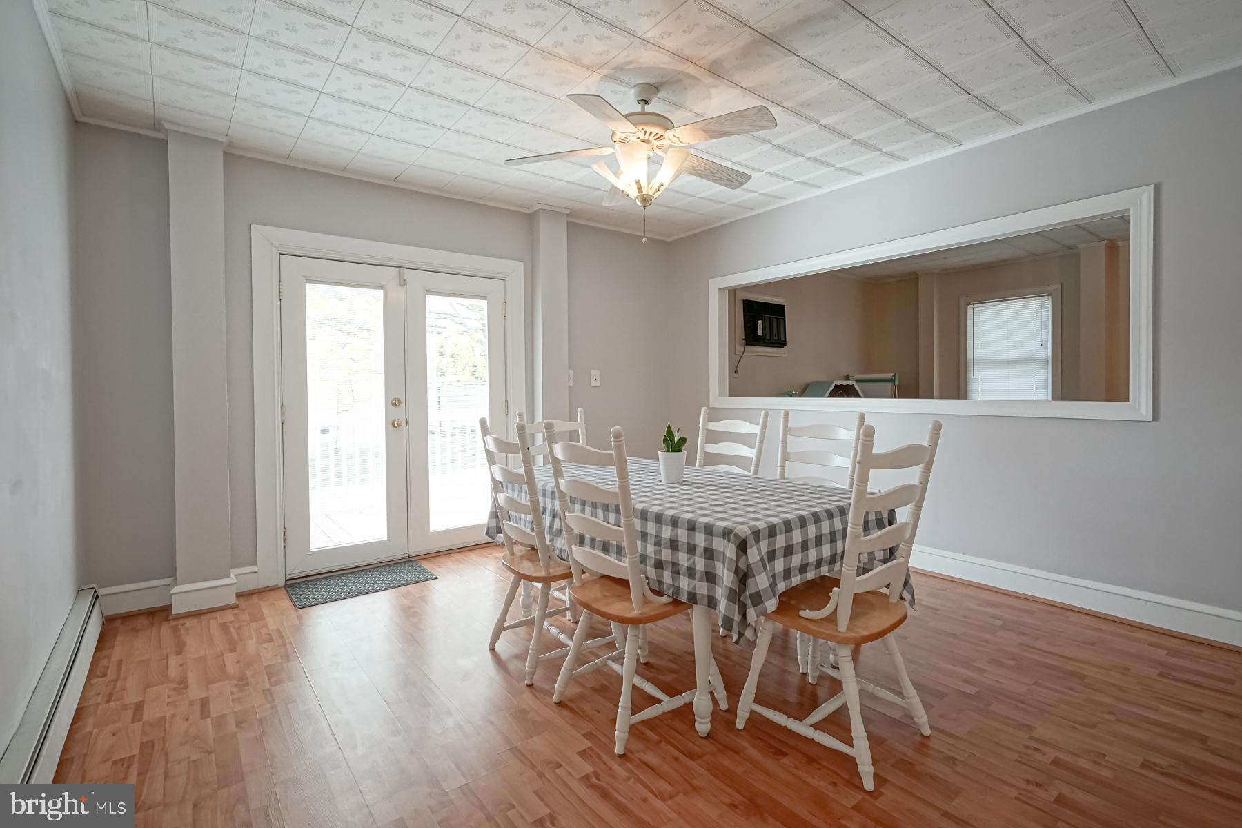 124 North 1st Road Hammonton, NJ 08037 - Photo 12 of 29 a view of a dining room with furniture and wooden floor