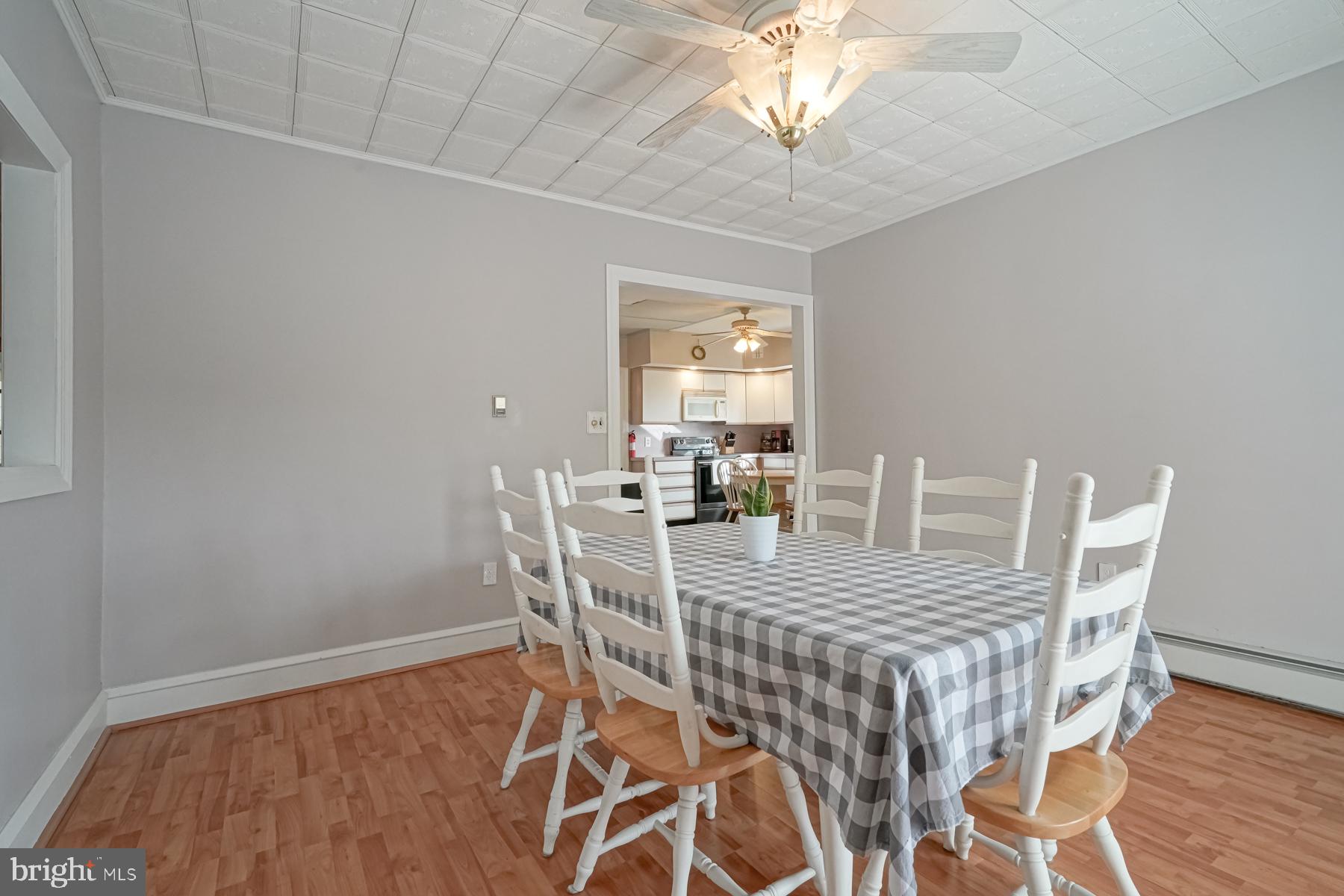 124 North 1st Road Hammonton, NJ 08037 - Photo 13 of 29 a view of a dining room with furniture and wooden floor