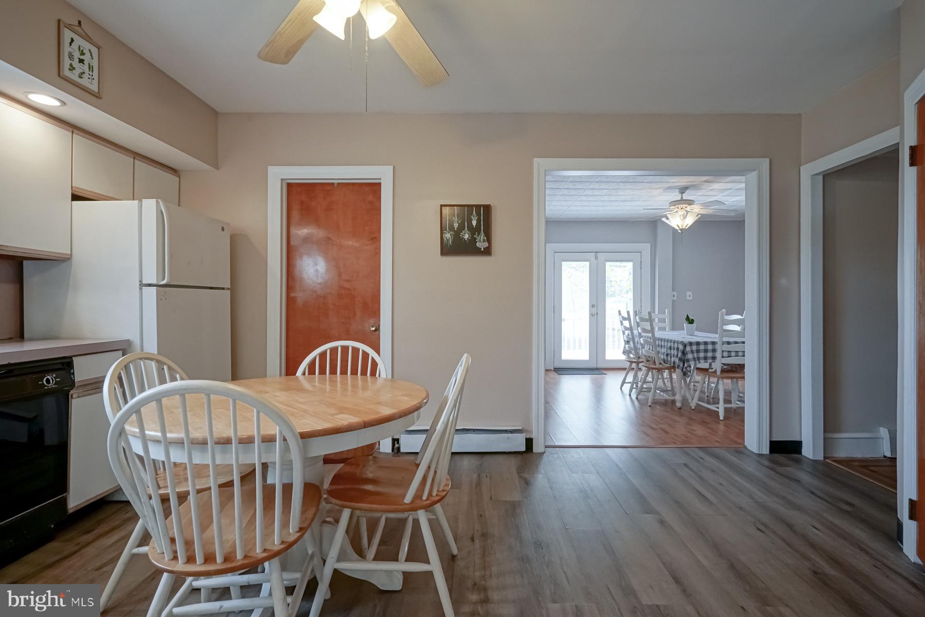 124 North 1st Road Hammonton, NJ 08037 - Photo 17 of 29 a view of a dining room with furniture and wooden floor