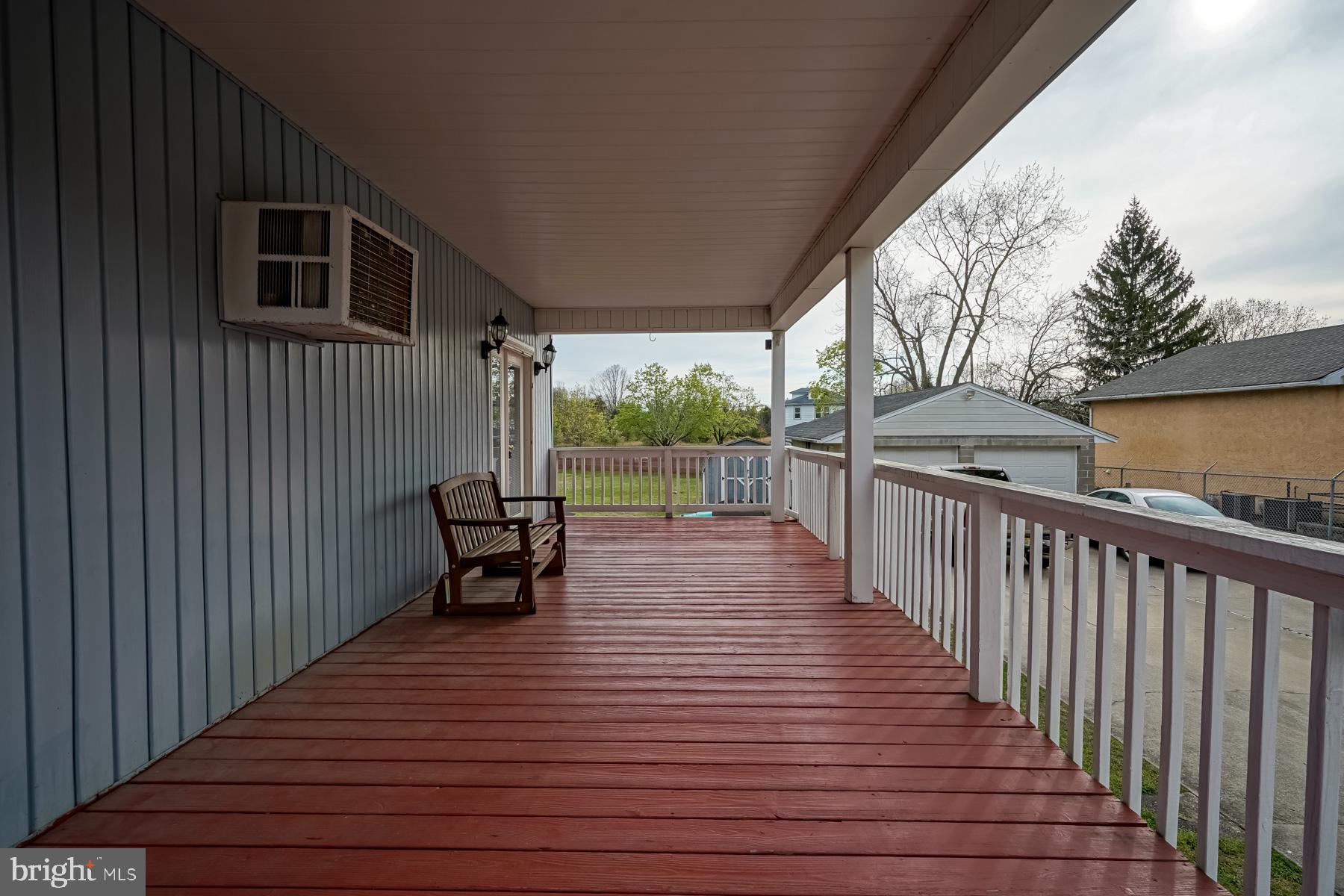 124 North 1st Road Hammonton, NJ 08037 - Photo 4 of 29 a view of a deck with wooden floor and outdoor seating
