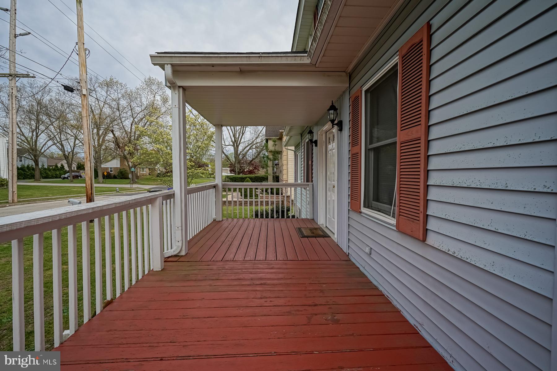 124 North 1st Road Hammonton, NJ 08037 - Photo 5 of 29 a view of balcony with wooden floor and fence