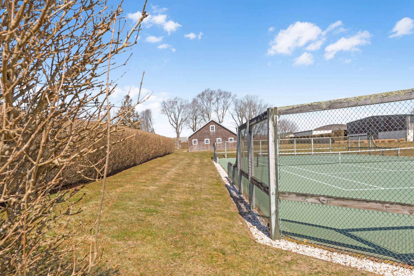 849 Hayground Road Water Mill, NY 11976 - Photo 18 of 31 a view of a balcony with a floor to ceiling window