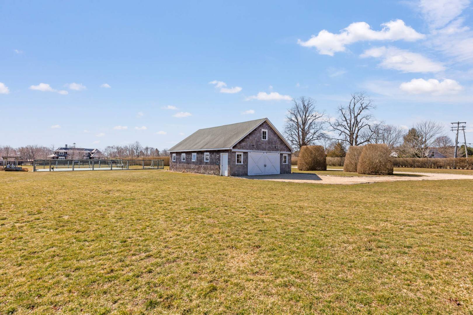849 Hayground Road Water Mill, NY 11976 - Photo 19 of 31 a house view with swimming pool and ocean view