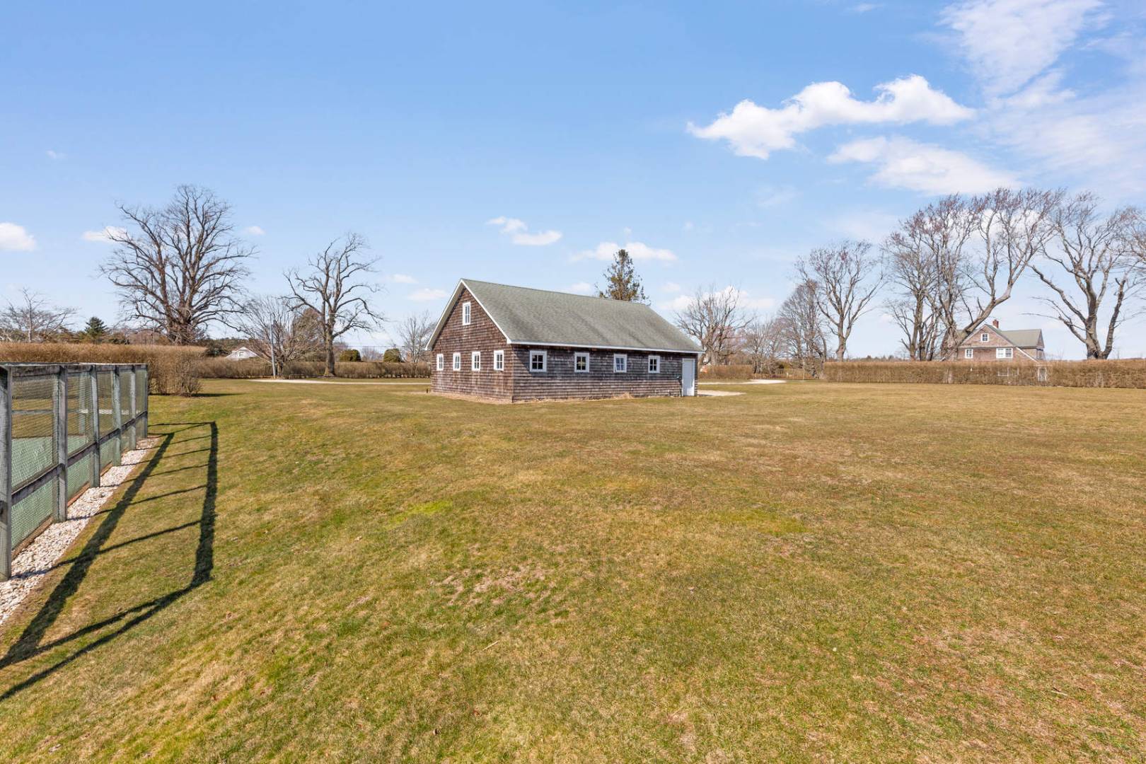 849 Hayground Road Water Mill, NY 11976 - Photo 22 of 31 a view of a lake with houses in the back
