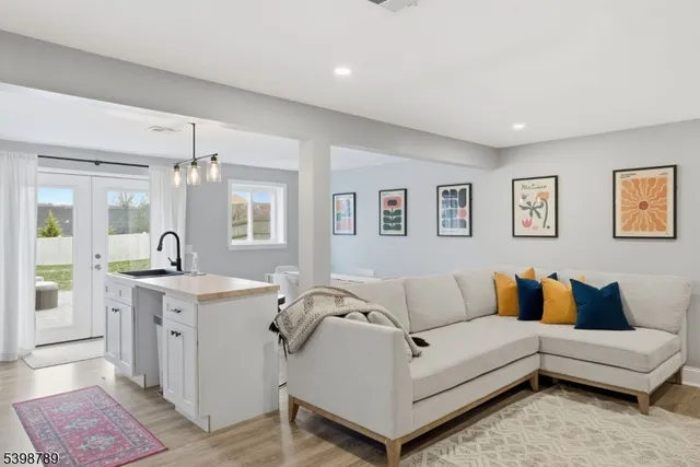 a living room with furniture and view