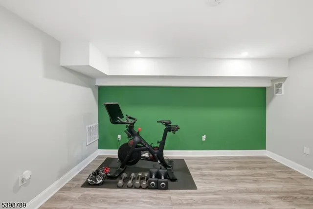 a room with a table and a potted plant
