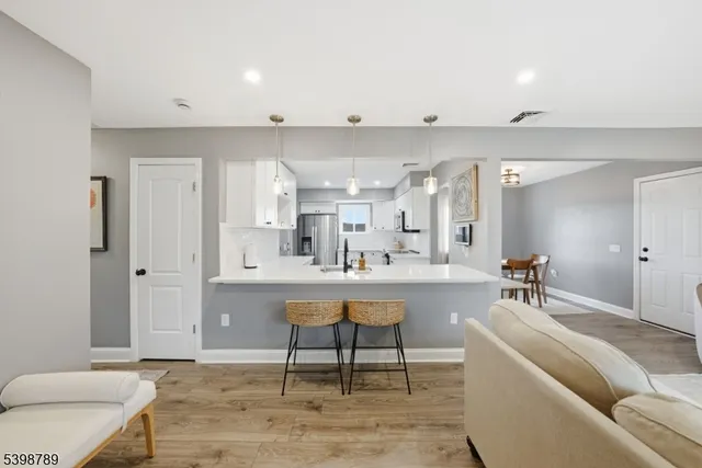 a living room with furniture and a table