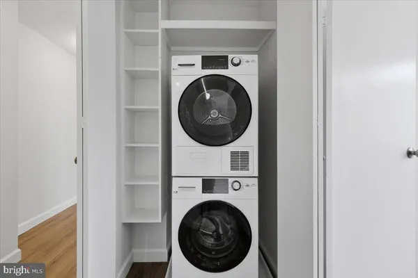 a utility room with dryer and washer