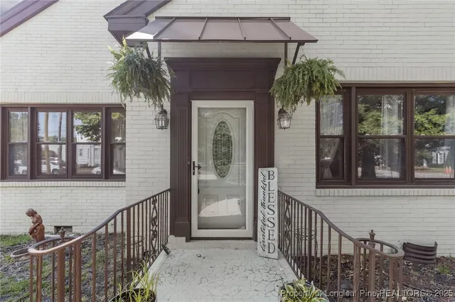 a view of a house with a porch