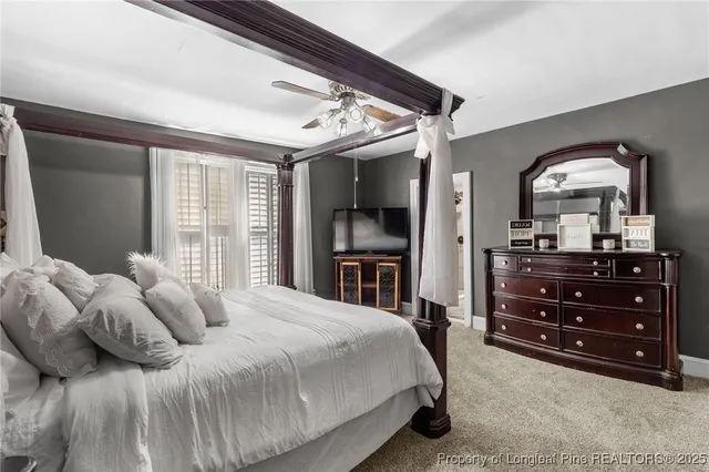 a bedroom with a bed and a large dresser
