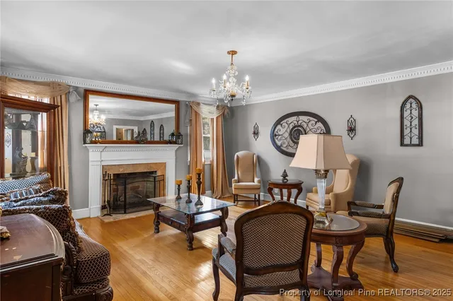 a view of a livingroom with furniture and a fireplace