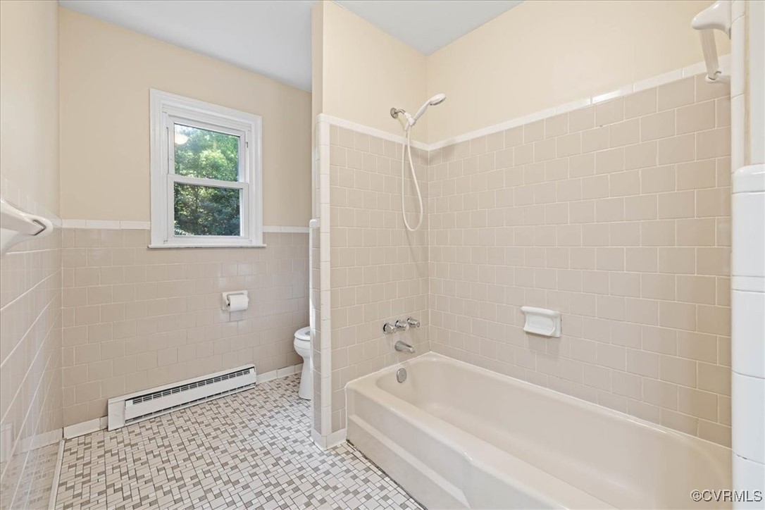 4200 Esposito Place Prince George, VA 23875 - Photo 14 of 29 Bathroom with a baseboard radiator, toilet, tile w