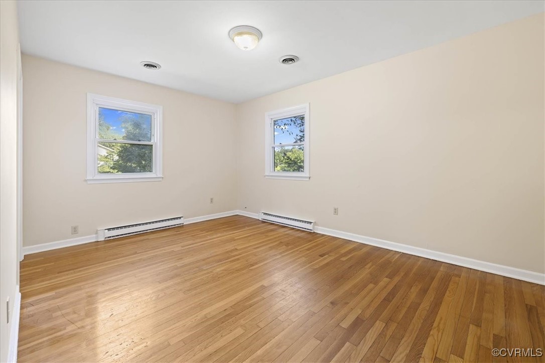 4200 Esposito Place Prince George, VA 23875 - Photo 17 of 29 Spare room with a baseboard radiator, baseboards,