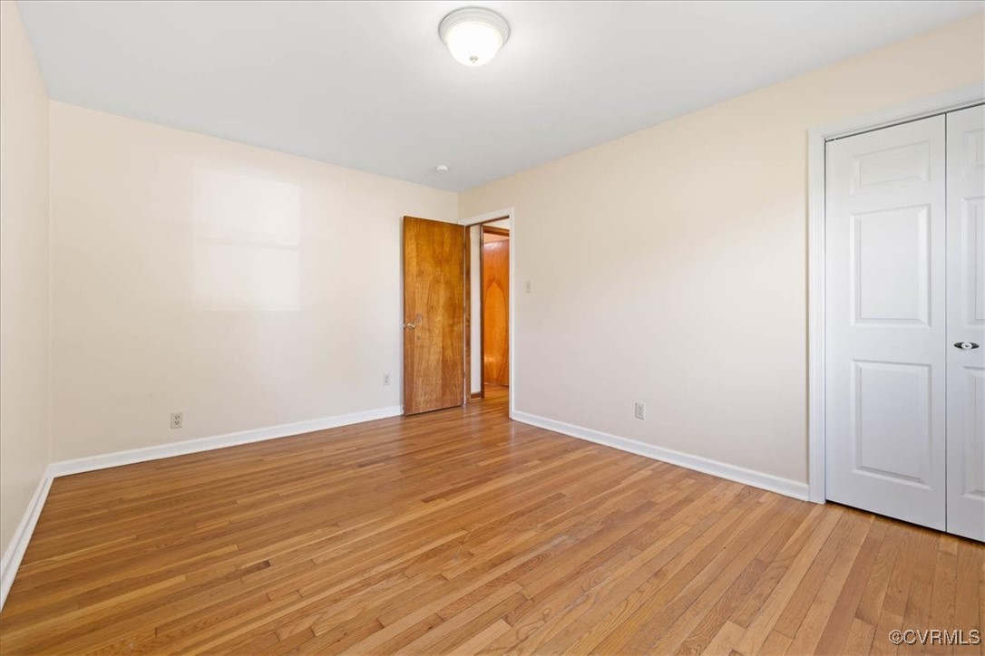 4200 Esposito Place Prince George, VA 23875 - Photo 18 of 29 Unfurnished bedroom with light wood-type flooring