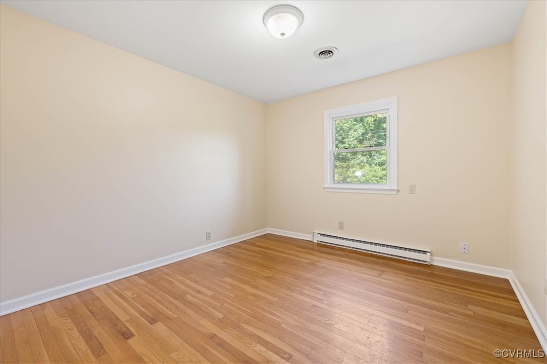 4200 Esposito Place Prince George, VA 23875 - Photo 19 of 29 Unfurnished room featuring baseboard heating, ligh