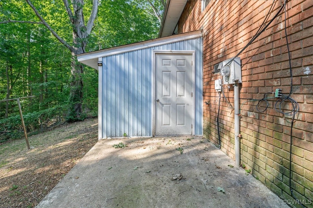4200 Esposito Place Prince George, VA 23875 - Photo 27 of 29 View of exterior entry with brick siding