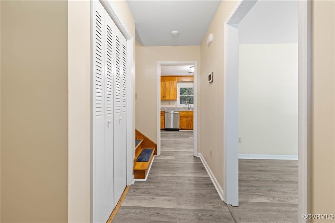 4200 Esposito Place Prince George, VA 23875 - Photo 4 of 29 Hall featuring wood finished floors, baseboards, a