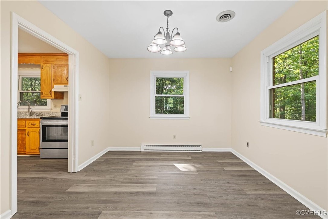 4200 Esposito Place Prince George, VA 23875 - Photo 7 of 29 Unfurnished dining area with baseboard heating, a
