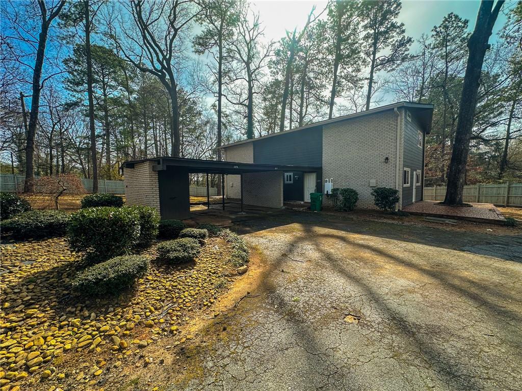 1277 Goodwin Road Northeast Atlanta, GA 30324 - Photo 4 of 21 a view of a house with a yard