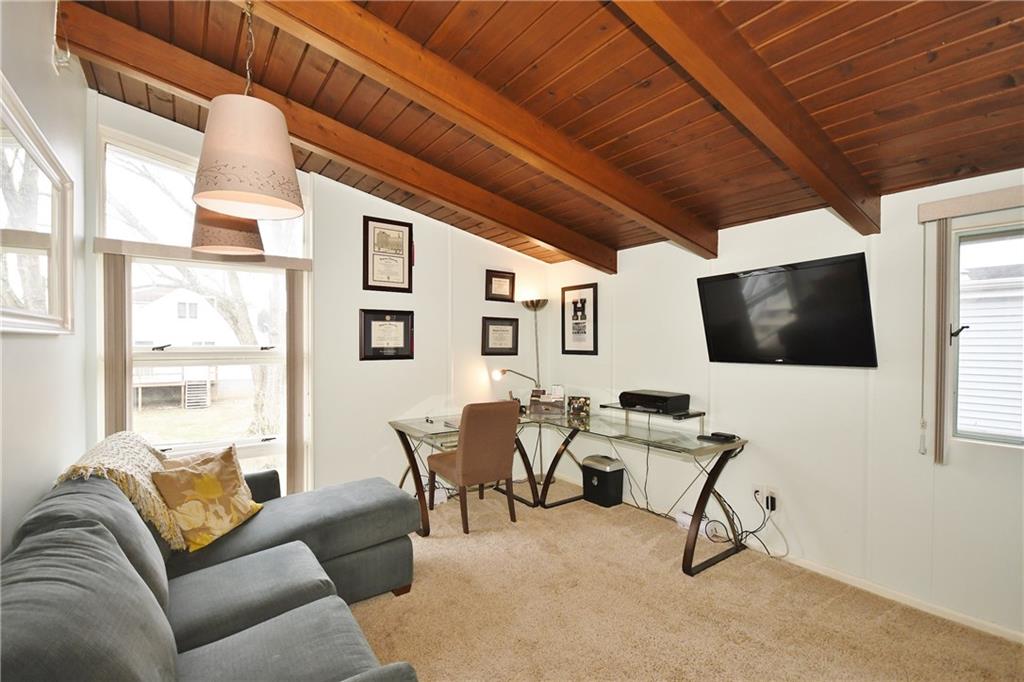 1939 Spring Valley Road Pittsburgh, PA 15243 - Photo 19 of 25 First Floor Flexible Space w/ wall to wall neutral carpeting and double closets. Attached full bathroom