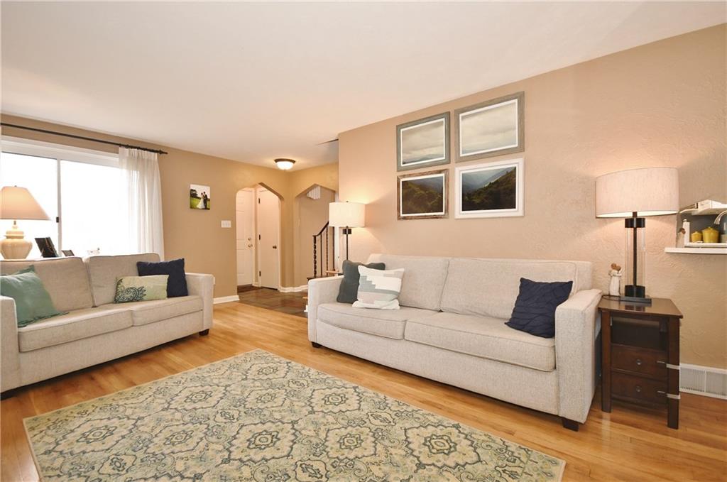 1939 Spring Valley Road Pittsburgh, PA 15243 - Photo 7 of 25 LARGE light and bright Living room W/hardwood floors, neutral wall color!