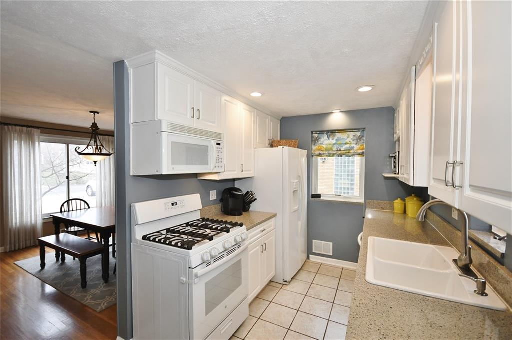 1939 Spring Valley Road Pittsburgh, PA 15243 - Photo 10 of 25 UPDATED kitchen / Light and Bright w/ white cabinetry, ceramic flooring