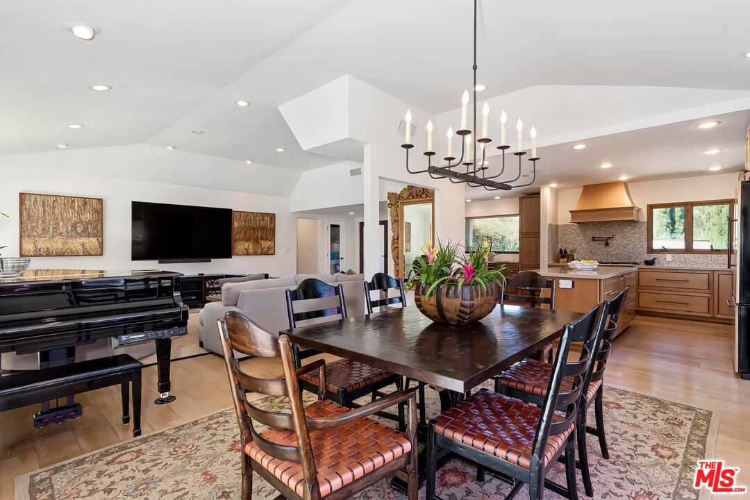 24537 Dry Canyon Cold Creek Road Calabasas, CA 91302 - Photo 12 of 54 a view of a dining room with furniture