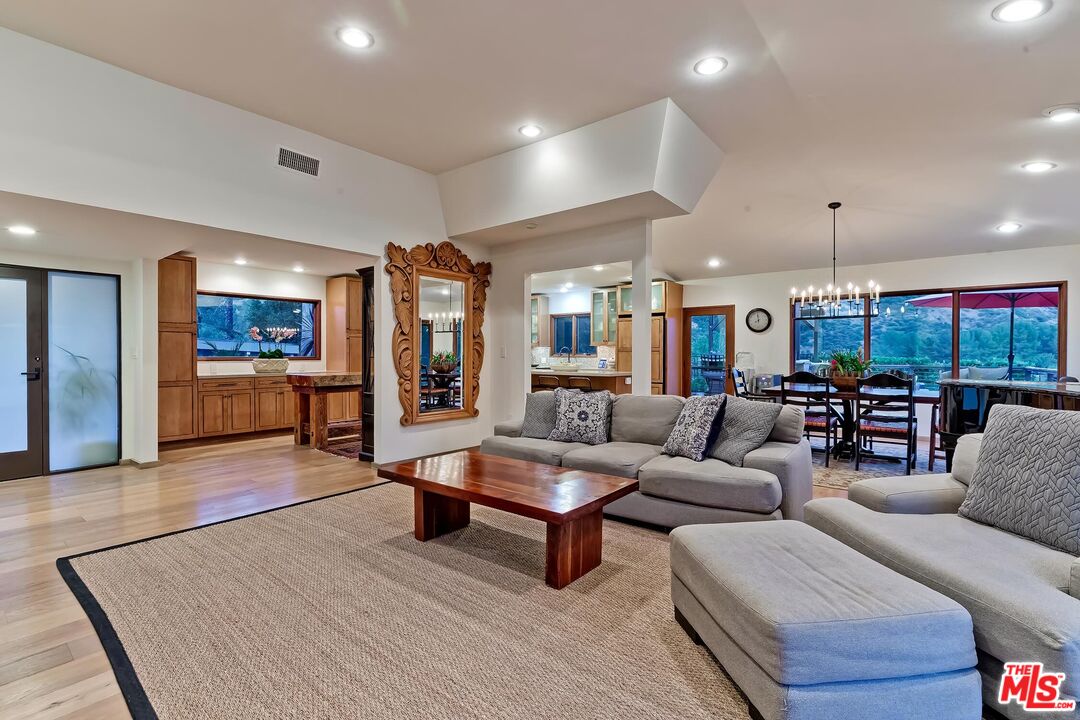 24537 Dry Canyon Cold Creek Road Calabasas, CA 91302 - Photo 42 of 54 a living room with furniture and a large window