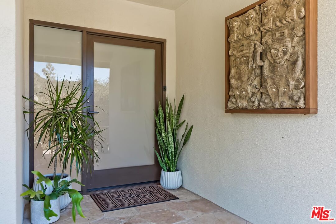 24537 Dry Canyon Cold Creek Road Calabasas, CA 91302 - Photo 5 of 54 a view of entryway with wooden floor