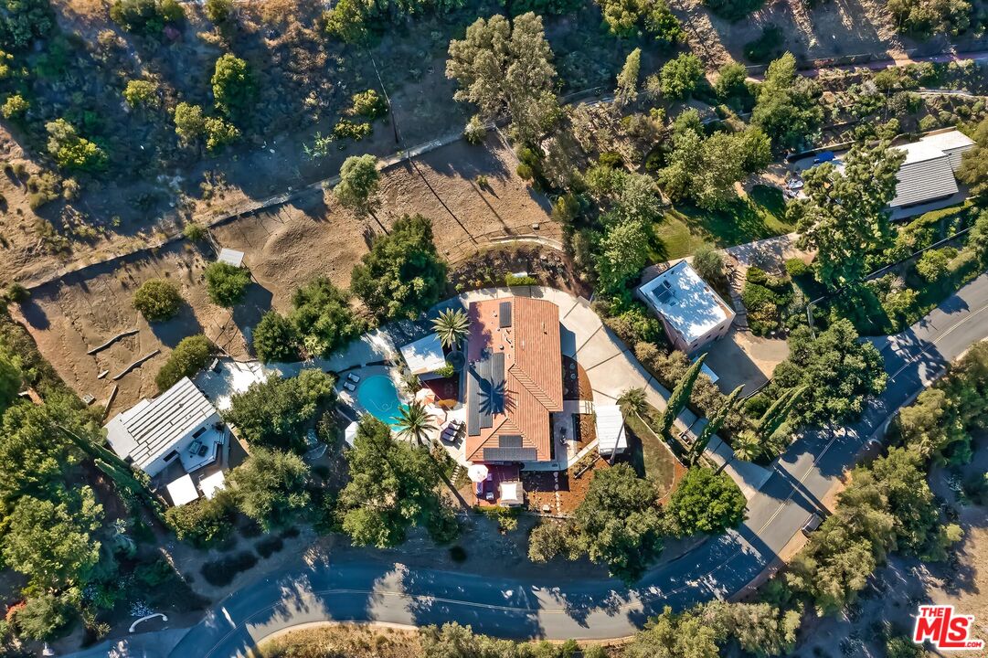 24537 Dry Canyon Cold Creek Road Calabasas, CA 91302 - Photo 52 of 54 an aerial view of multiple house with outdoor space