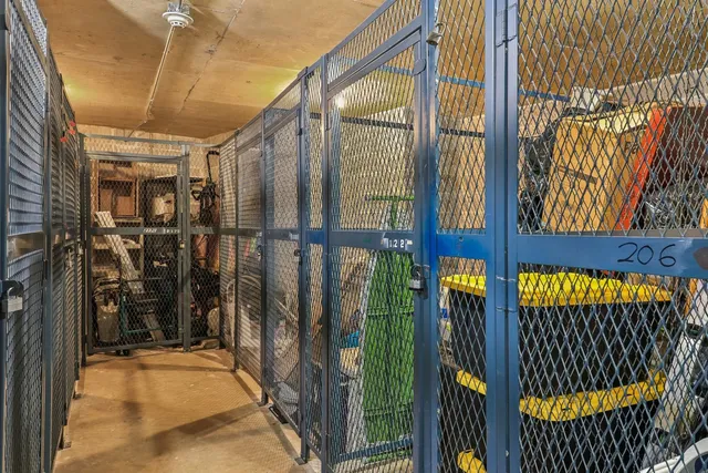 an outdoor space with swimming pool and furniture