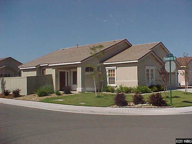 1798 Trek Trail Reno, NV 89521 - Photo 1 of 7 a front view of a house with a yard and outdoor seating