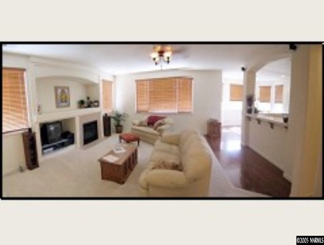 1798 Trek Trail Reno, NV 89521 - Photo 2 of 7 a living room with furniture and a wooden floor