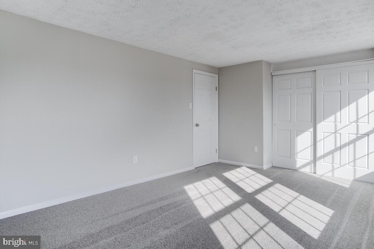 1308 Apple Ridge Court Edgewood, MD 21040 - Photo 19 of 38 a view of wooden floor and windows in a room