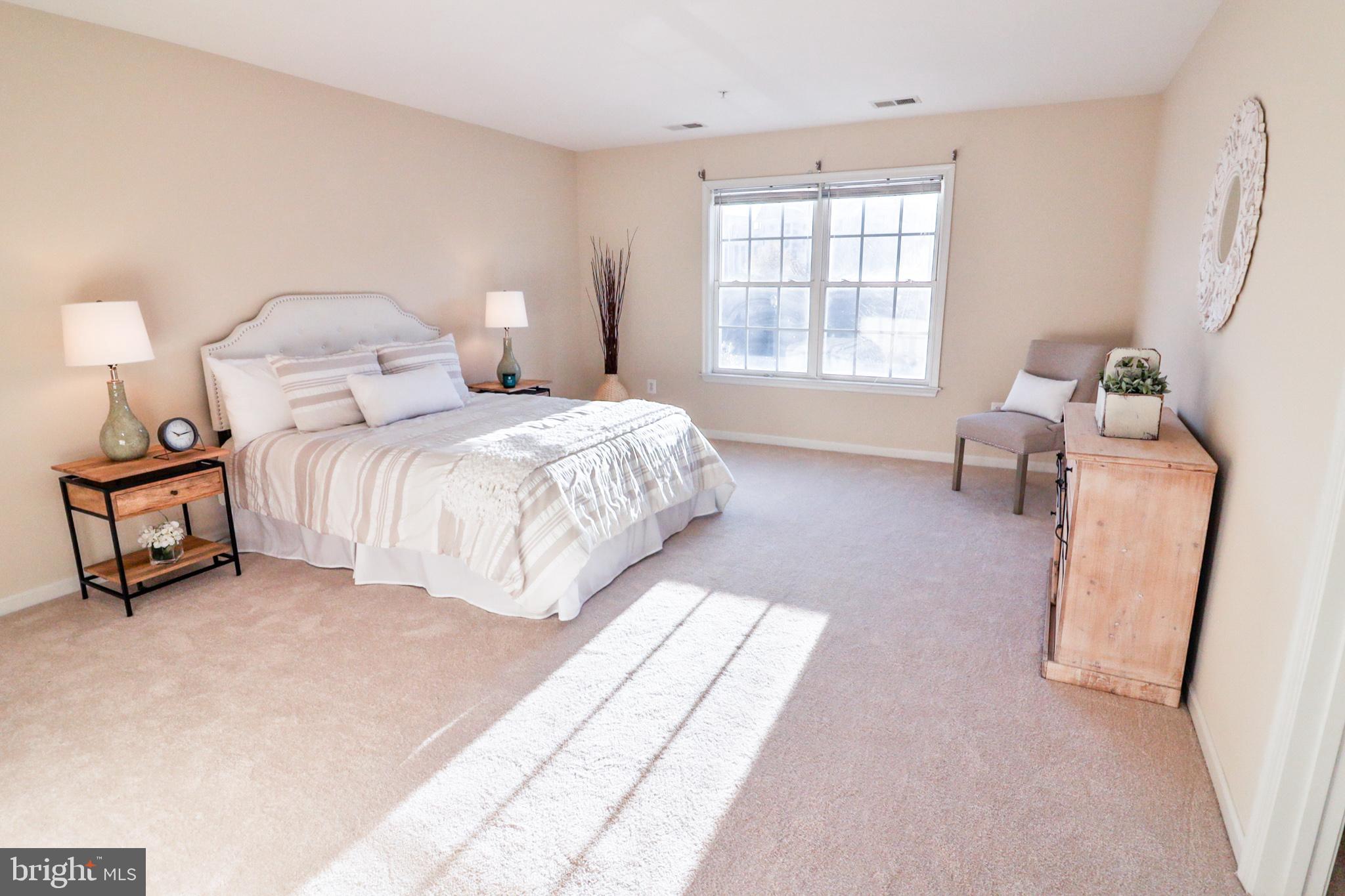 1006 Gaither Road Rockville, MD 20850 - Photo 37 of 68 Large primary bedroom w/ two walk-in closets