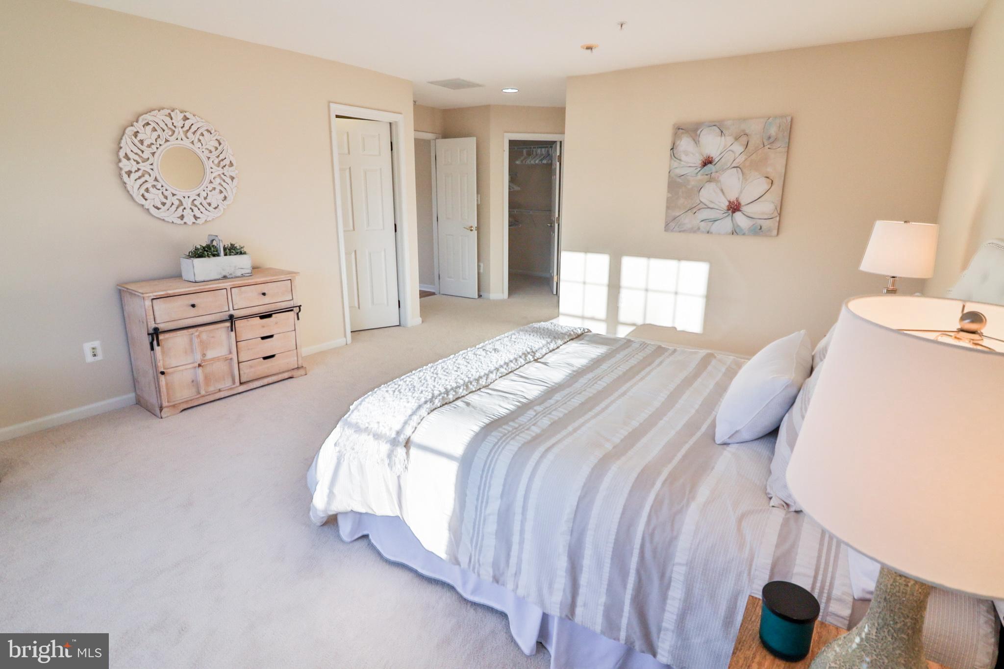 1006 Gaither Road Rockville, MD 20850 - Photo 38 of 68 Large primary bedroom w/ two walk-in closets