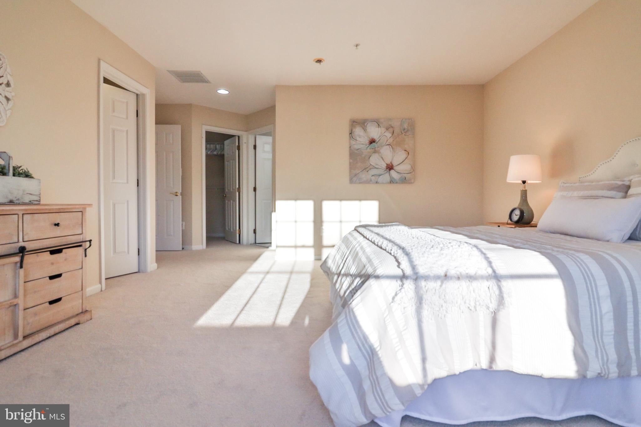 1006 Gaither Road Rockville, MD 20850 - Photo 39 of 68 Large primary bedroom w/ two walk-in closets