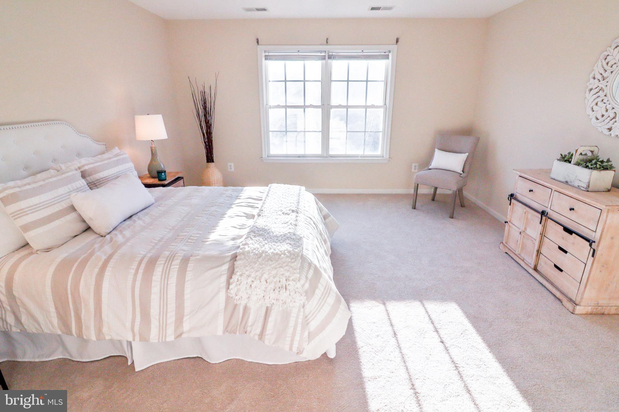 1006 Gaither Road Rockville, MD 20850 - Photo 40 of 68 Large primary bedroom w/ two walk-in closets