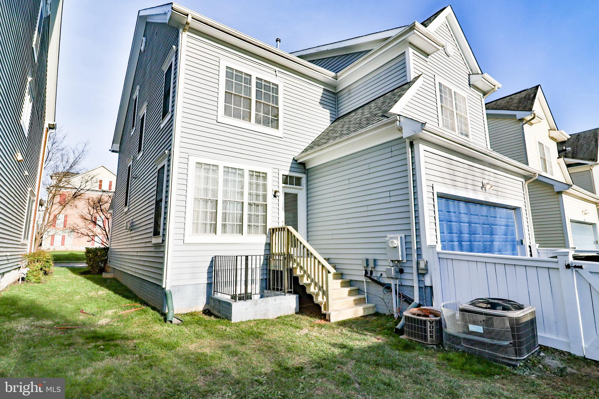 1006 Gaither Road Rockville, MD 20850 - Photo 66 of 68 Back yard with stairs to family room