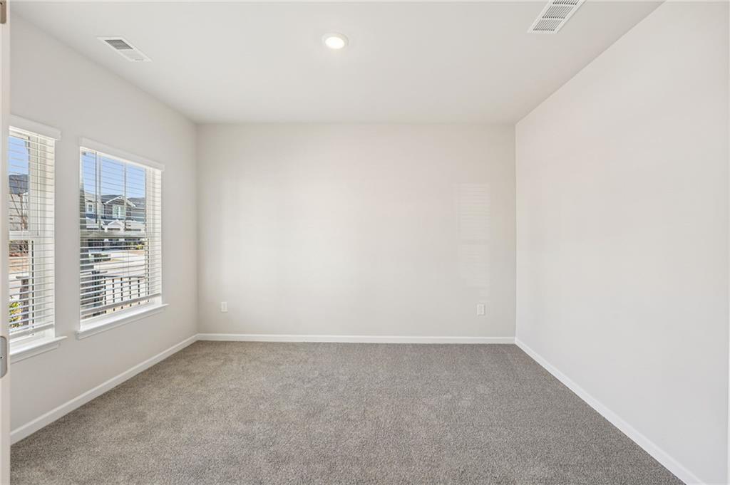 4412 Brick Tunl Street Powder Springs, GA 30127 - Photo 28 of 72 a view of an empty room with a window