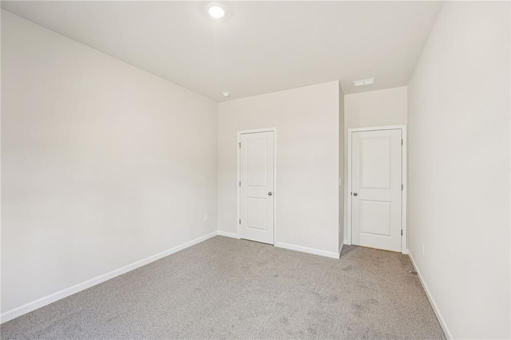 4412 Brick Tunl Street Powder Springs, GA 30127 - Photo 37 of 72 a view of an empty room