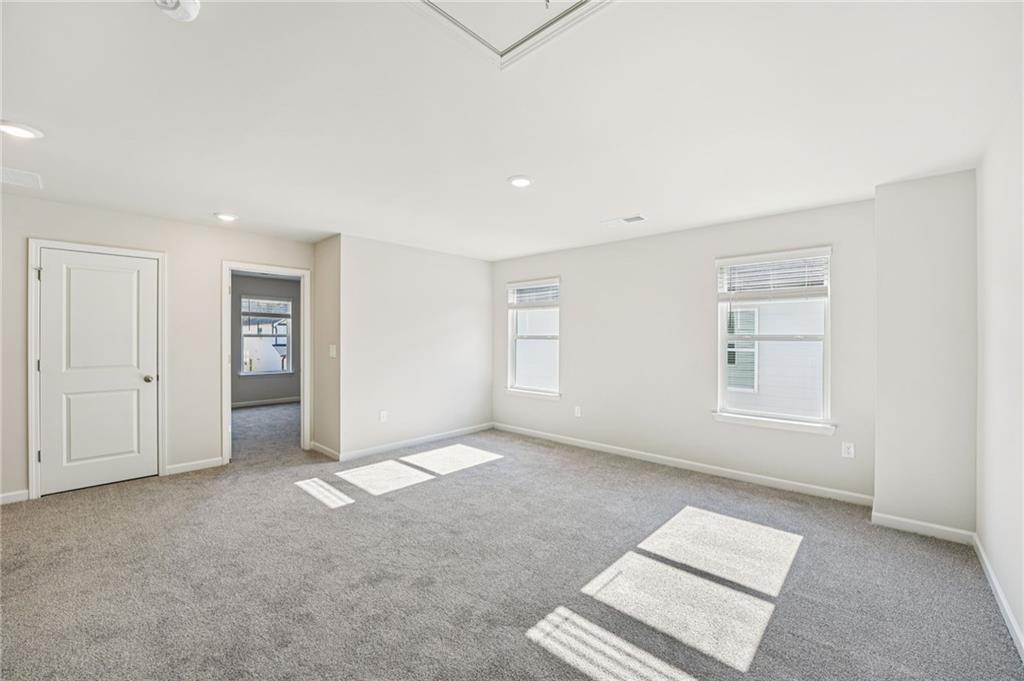 4412 Brick Tunl Street Powder Springs, GA 30127 - Photo 40 of 72 a view of an empty room with a window
