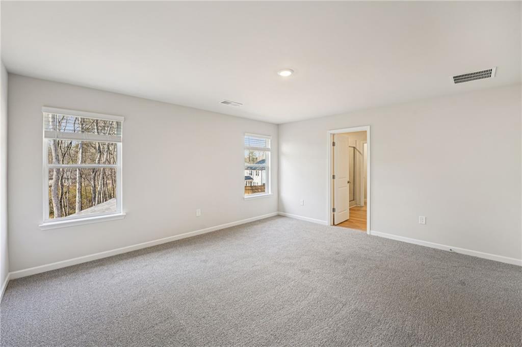 4412 Brick Tunl Street Powder Springs, GA 30127 - Photo 46 of 72 an empty room with a window