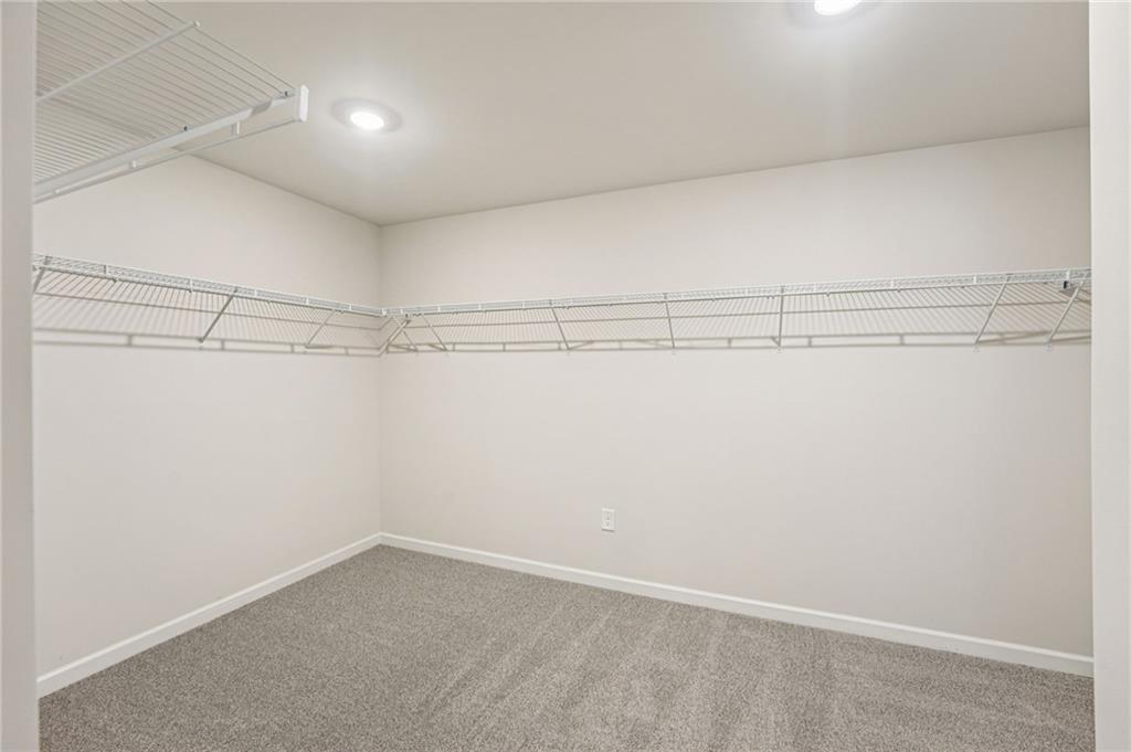4412 Brick Tunl Street Powder Springs, GA 30127 - Photo 49 of 72 a view of a room with racks on the wall