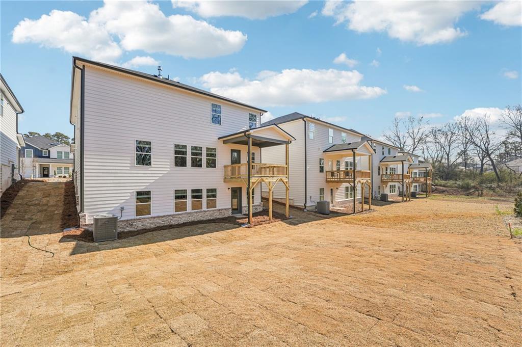 4412 Brick Tunl Street Powder Springs, GA 30127 - Photo 70 of 72 a view of a house with snow on the road