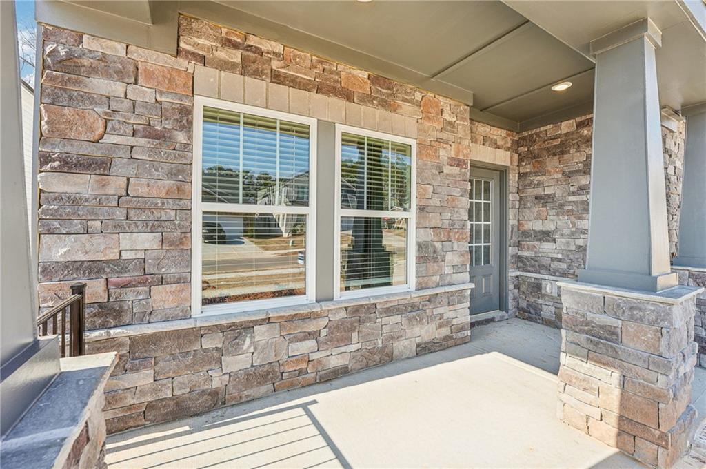 4412 Brick Tunl Street Powder Springs, GA 30127 - Photo 7 of 72 a bathroom with a bathtub and window