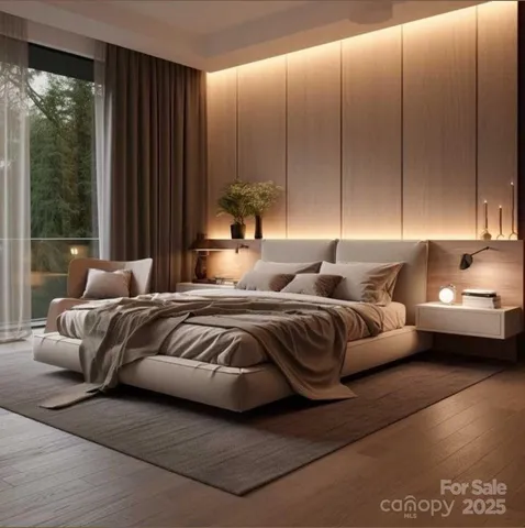 a bedroom with a large bed and a couch next to a window