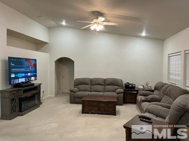 4335 Rancheria Road Fallon, NV 89406 - Photo 13 of 36 a living room with furniture and a flat screen tv