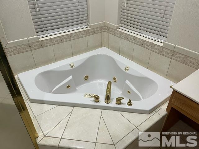 4335 Rancheria Road Fallon, NV 89406 - Photo 21 of 36 a bathroom with a bathtub and a sink